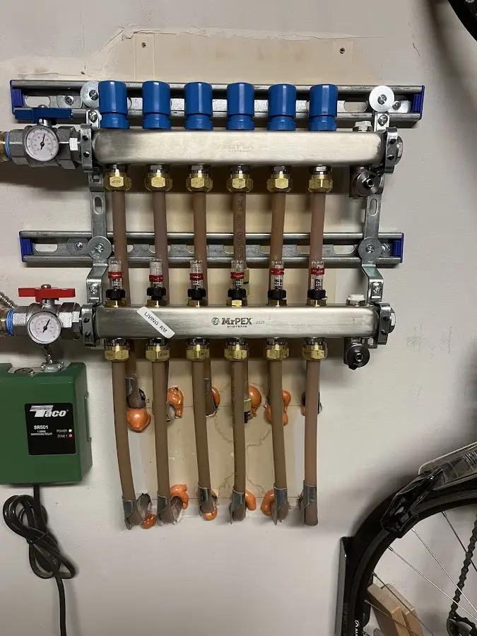 Plumber performing Gas Line Installation at a residential property in Crystal